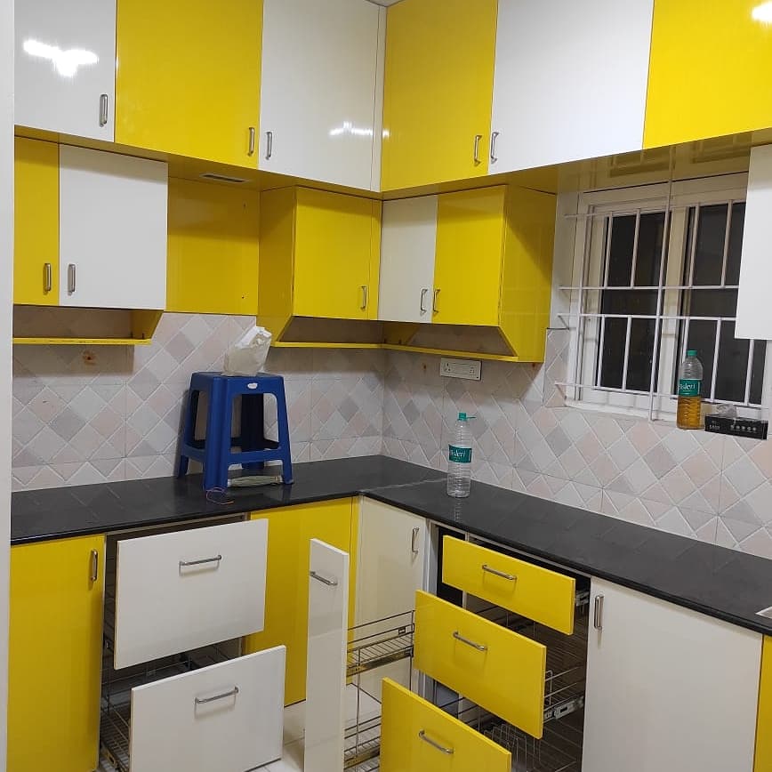 PVC moduler kitchen designed with yellow white combination