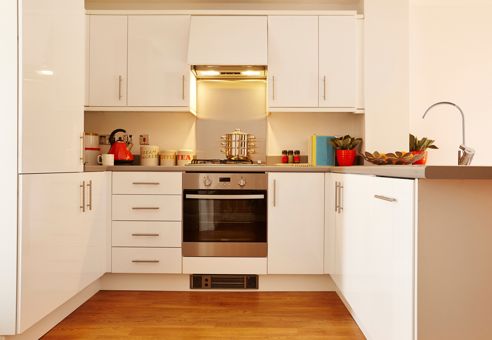 Plain yellow theme PVC interior kitchen at bengaluru