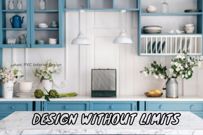 Unleash creativity with Janani PVC Interior Design in Bengaluru, featuring a kitchen with limitless design possibilities, highlighted by bold blue cabinetry and chic open shelving