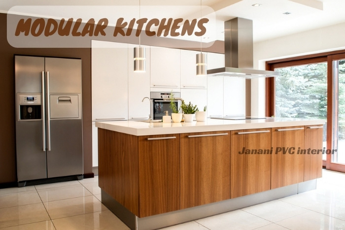 Elegant and functional Bengaluru kitchen outfitted with Janani PVC Interior’s modular solutions, highlighting a blend of white and wood-toned PVC cabinets for a modern home