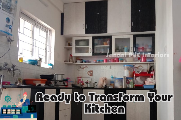 Functional and spacious kitchen design by Janani PVC Interiors in Bengaluru, featuring sleek black and white cabinetry ready to enhance and transform kitchens in Bengaluru homes