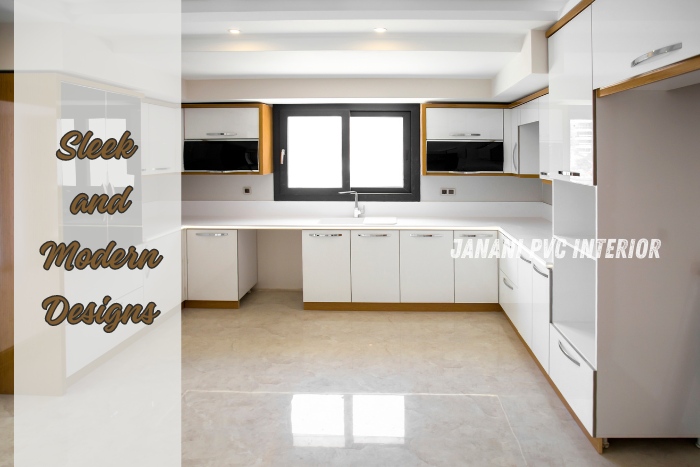 Sleek and modern PVC kitchen design by Janani PVC Interior Design in Bengaluru, featuring stylish white cabinetry and efficient layout solutions ideal for contemporary urban living