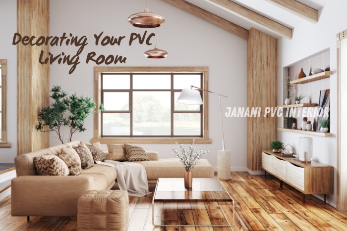 Charming PVC living room decor by Janani PVC Interior Design in Bengaluru, featuring a cozy beige sectional sofa, wooden flooring, natural light, and stylish shelves. Ideal for creating a warm and inviting space with modern PVC elements.