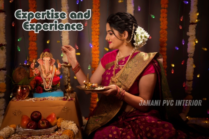 Traditional Indian woman performing a puja ceremony in a beautifully decorated space designed by Janani PVC Interior in Bengaluru, illustrating the expertise and cultural richness of the brand in creating authentic Indian interiors